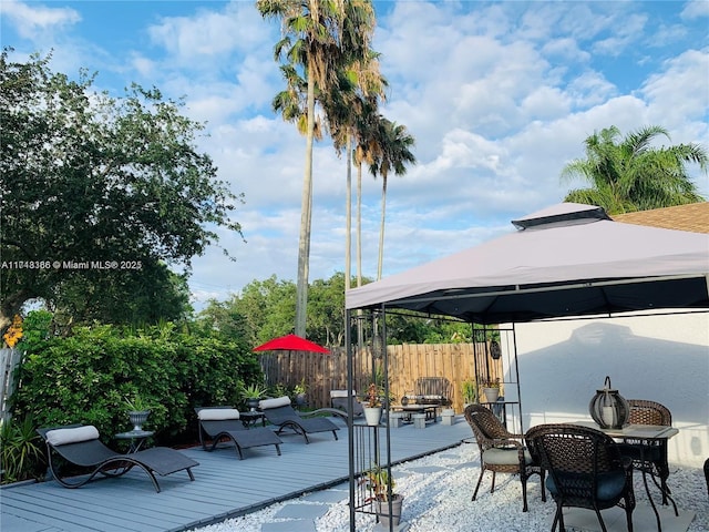 view of patio featuring a gazebo and a deck