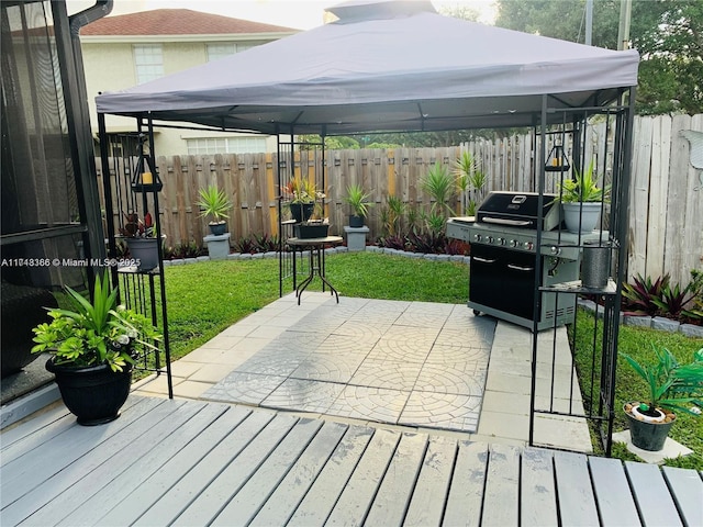 view of patio / terrace featuring a gazebo and area for grilling