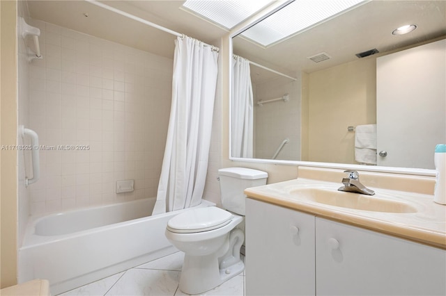 full bathroom with tile patterned flooring, vanity, shower / bath combo, and toilet