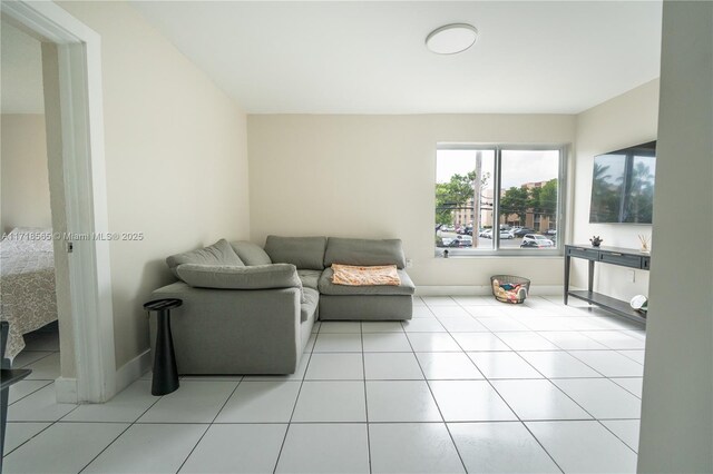 living room with light tile patterned floors