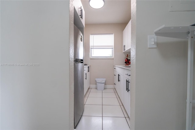 bathroom with vanity and tile patterned floors