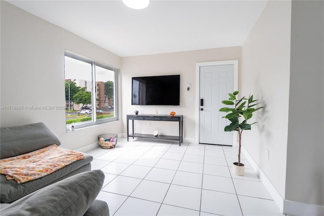 living room with light tile patterned flooring