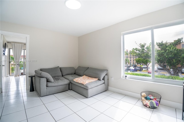 living room featuring light tile patterned floors