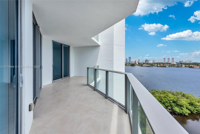 balcony featuring a water view