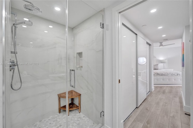 bathroom with a shower with shower door