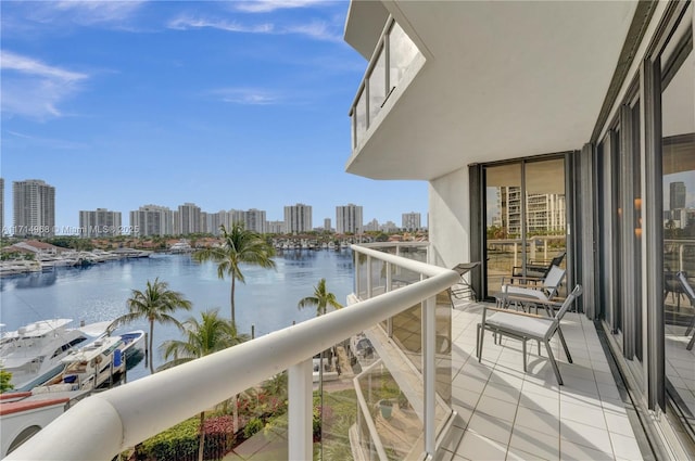 balcony featuring a water view