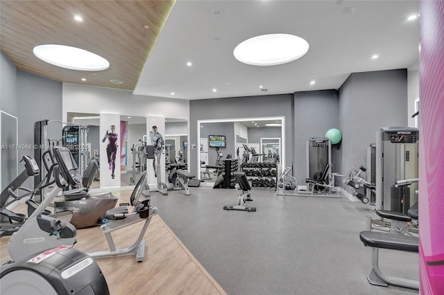 exercise room featuring wood ceiling