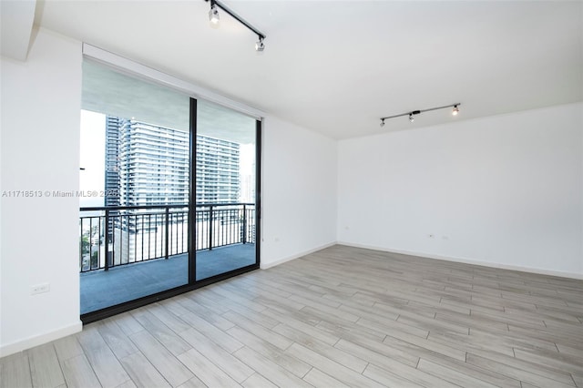 empty room featuring light hardwood / wood-style floors