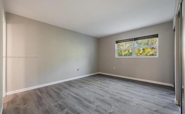 unfurnished room featuring light hardwood / wood-style flooring