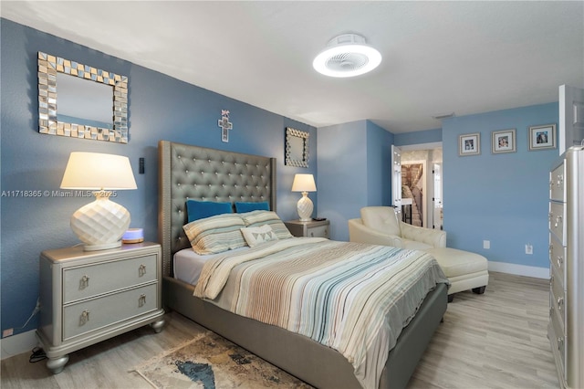 bedroom featuring light hardwood / wood-style flooring