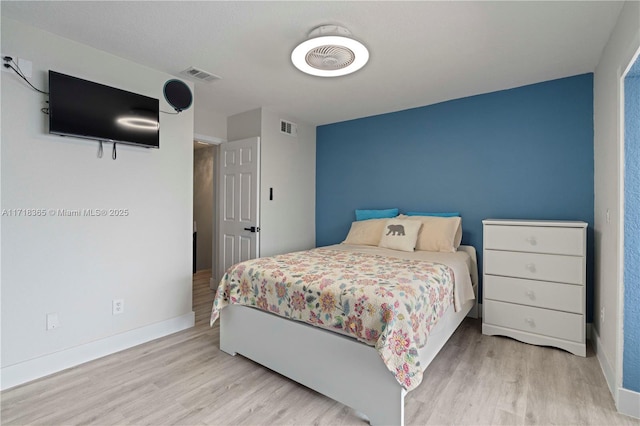 bedroom featuring light wood-type flooring