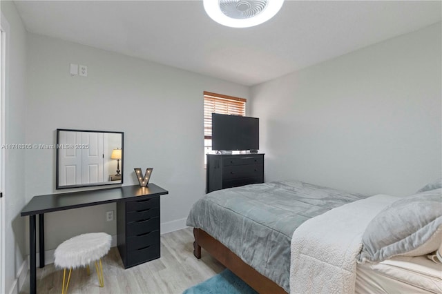 bedroom featuring light wood-type flooring