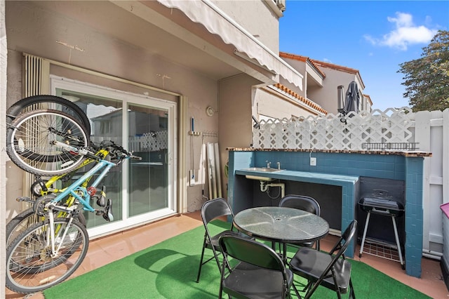 view of patio with area for grilling