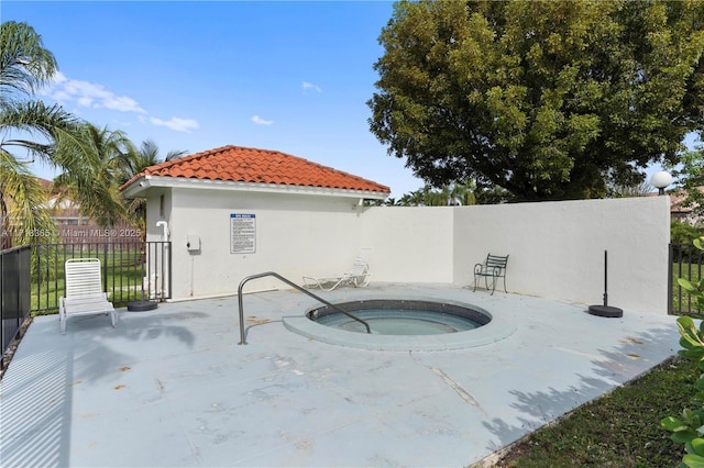 view of pool featuring a community hot tub