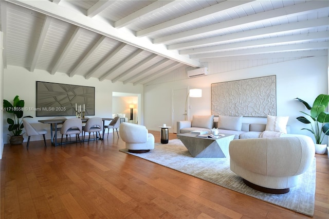 living room with lofted ceiling with beams, wood-type flooring, and a wall unit AC