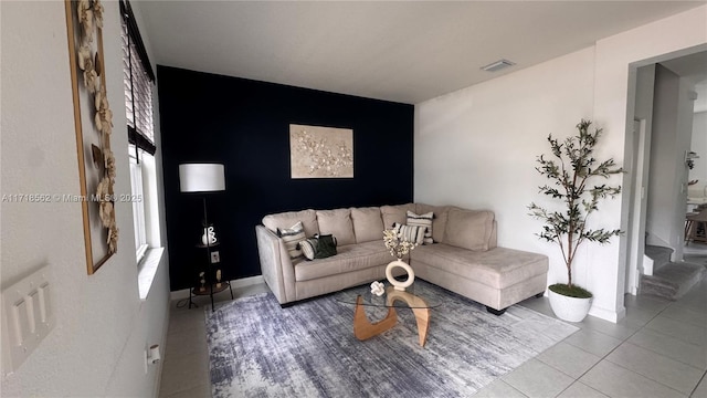 living room featuring tile patterned floors