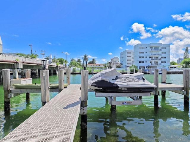 dock area featuring a water view