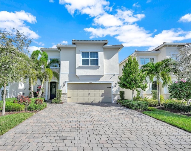 view of front of property with a garage