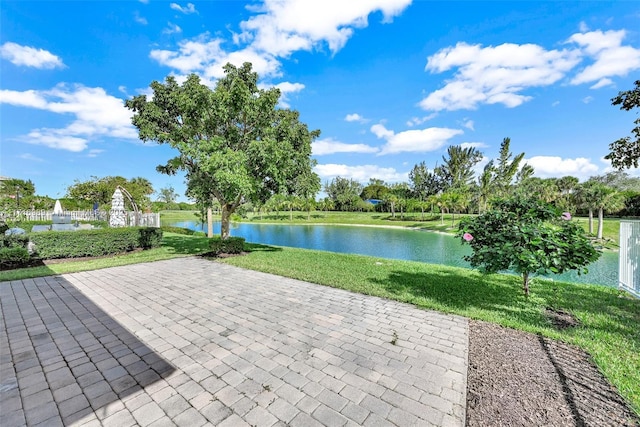 view of patio featuring a water view