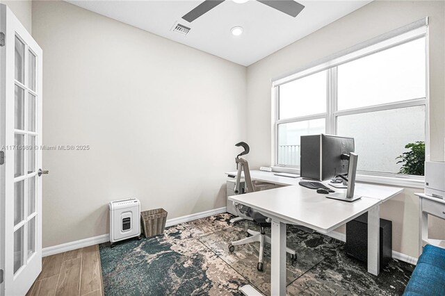 office with dark wood-type flooring, french doors, and ceiling fan