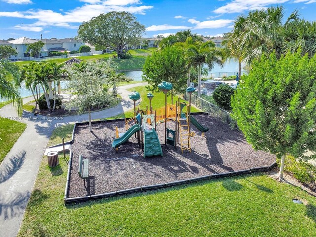 view of jungle gym featuring a water view