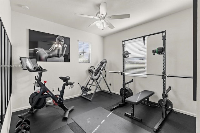 exercise room featuring ceiling fan and plenty of natural light