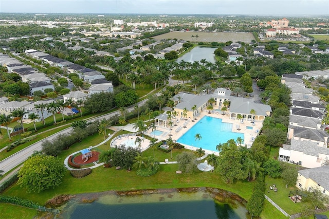 birds eye view of property featuring a water view