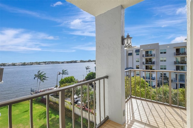 balcony featuring a water view