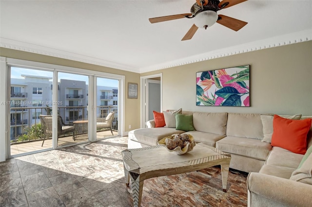 tiled living room featuring ceiling fan and crown molding