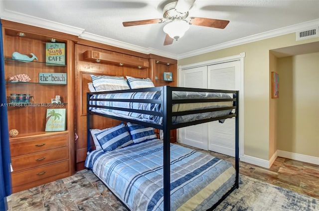 bedroom with ceiling fan, a closet, and ornamental molding