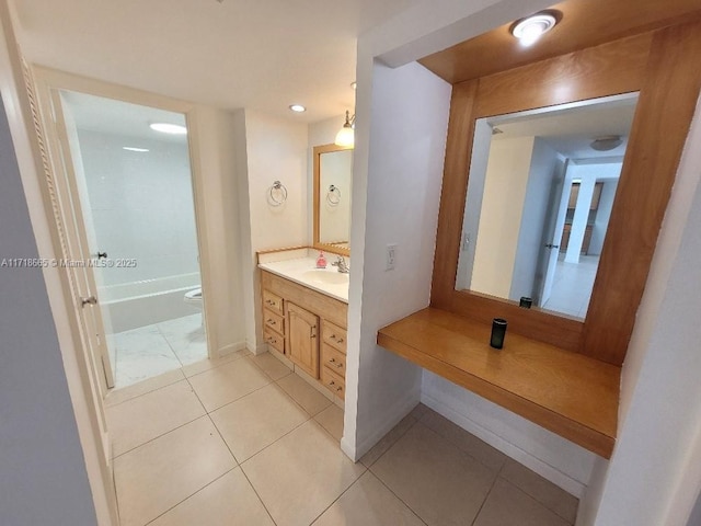 bathroom with tile patterned floors, vanity, and toilet