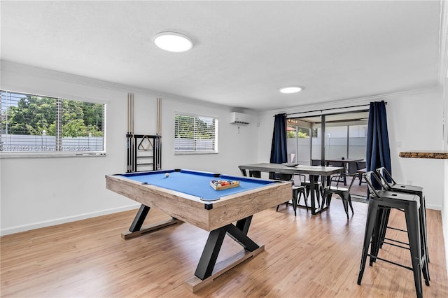 game room with crown molding, pool table, a textured ceiling, light wood-type flooring, and a wall unit AC