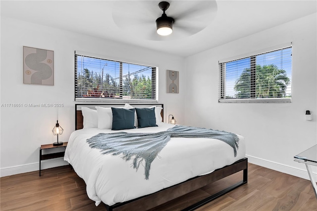 bedroom featuring ceiling fan and wood-type flooring