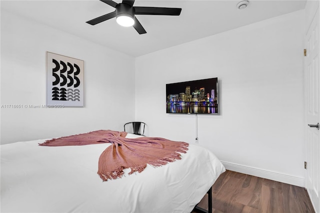 bedroom featuring ceiling fan and wood-type flooring