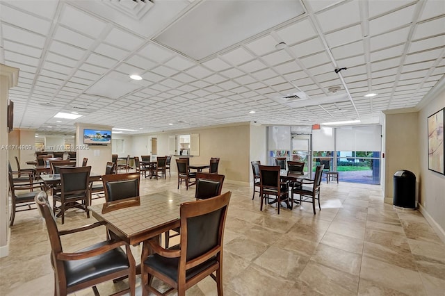 dining area featuring expansive windows