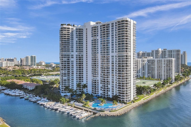 view of building exterior with a water view