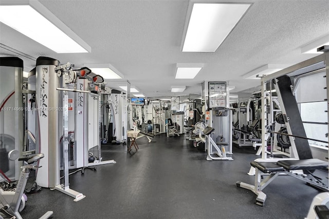 workout area with a textured ceiling