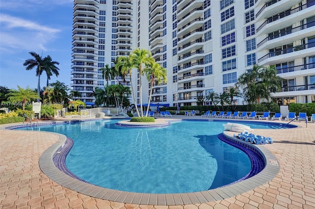 view of pool featuring a patio