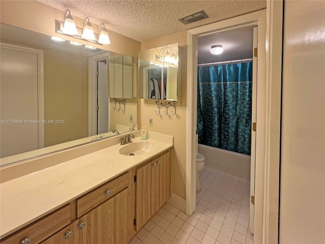 full bathroom with vanity, a textured ceiling, shower / bathtub combination with curtain, tile patterned flooring, and toilet