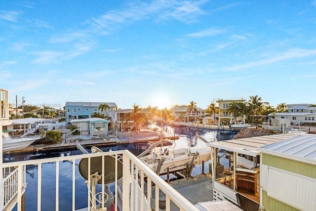 balcony featuring a boat dock