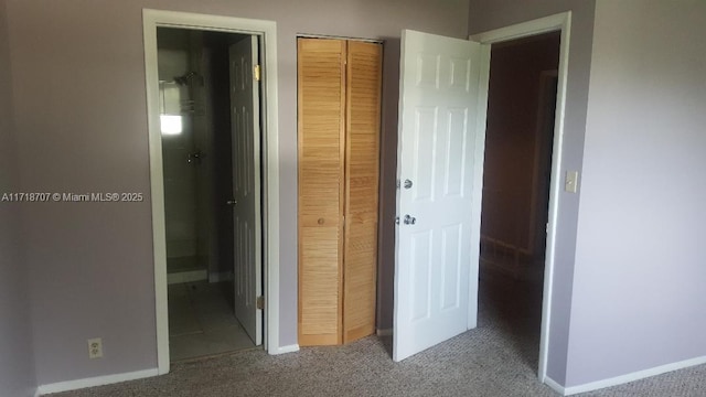 unfurnished bedroom with carpet floors