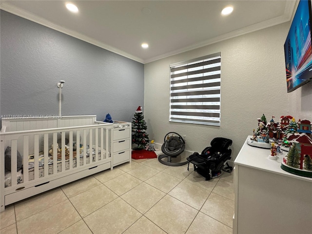 tiled bedroom with a crib and crown molding