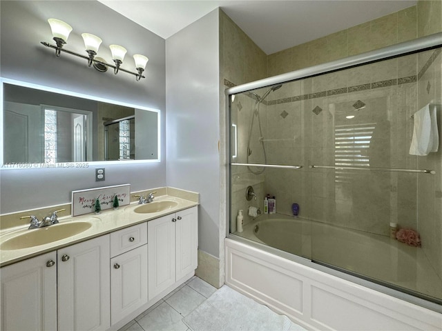 bathroom featuring vanity and enclosed tub / shower combo