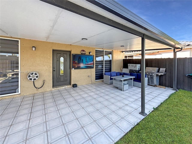 view of patio / terrace featuring area for grilling and an outdoor hangout area