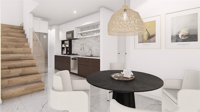 dining space with stairs, a notable chandelier, recessed lighting, and marble finish floor