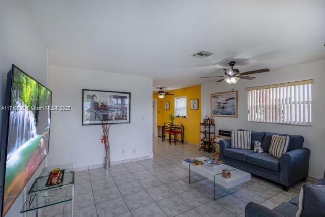 living room with ceiling fan