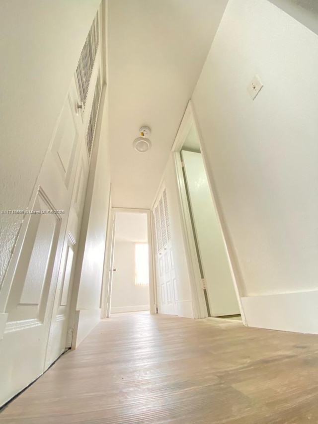 hall featuring hardwood / wood-style flooring