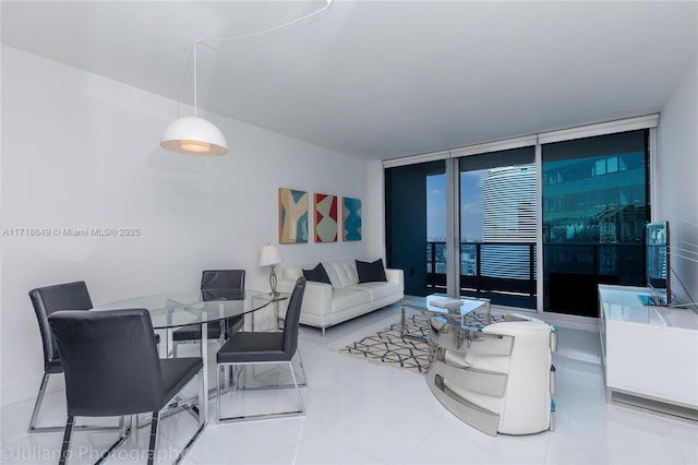 living room with floor to ceiling windows