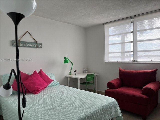 bedroom featuring a textured ceiling