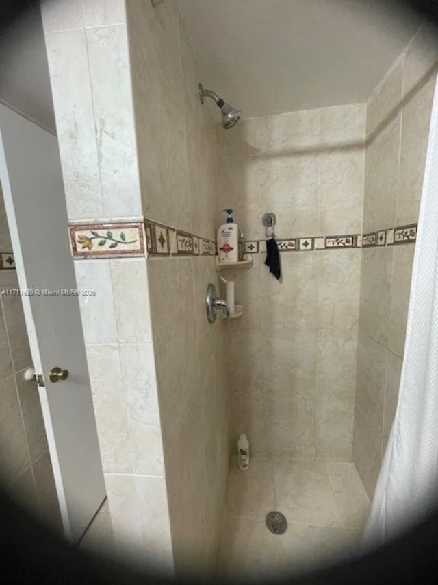 bathroom featuring walk in shower